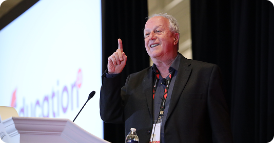 Speaker sharing education insights at the conference