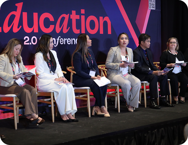 Panel of speakers on stage at the Education 2.0 Conference